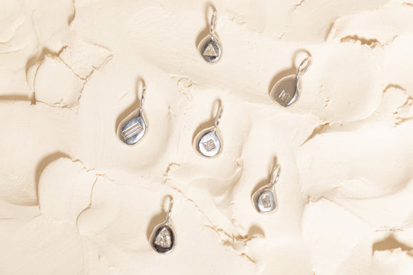 Cumulus XIV Charm 18